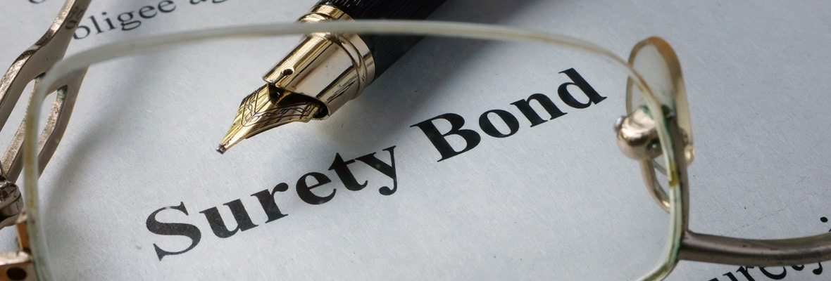 Page Of Newspaper With Words Surety Bond